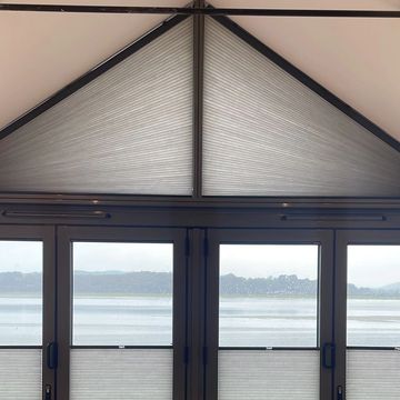 Motorised shaped gable blinds