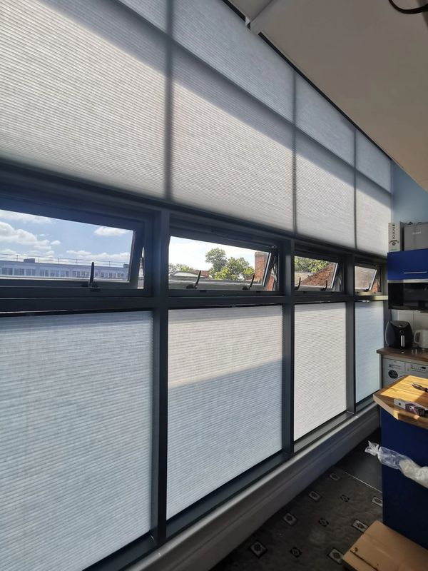 motorised duette blinds and manual pull up tension blinds
