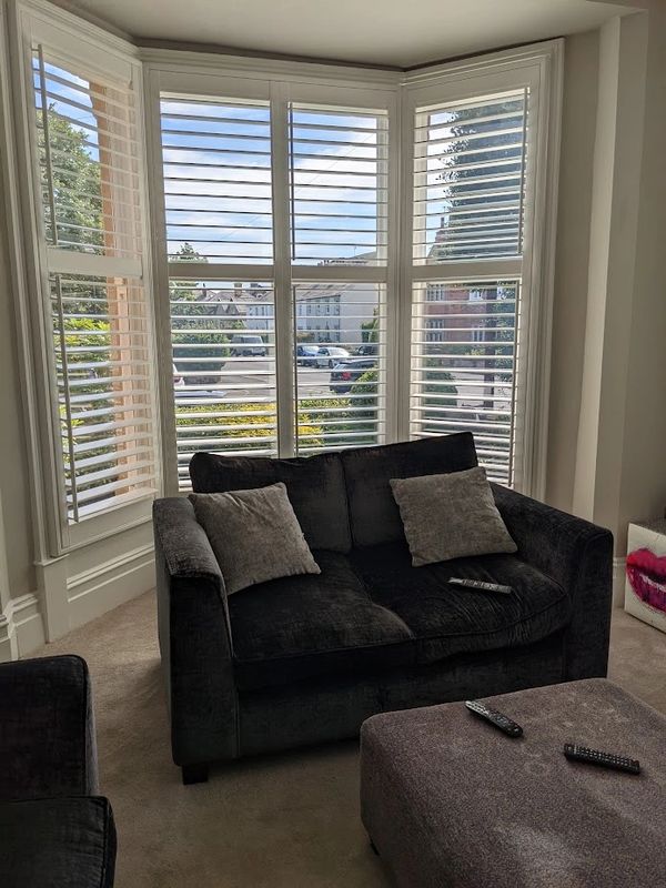 vinyl shutters  fitted in bay window in lytham st annes