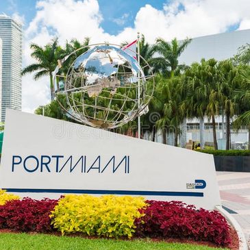 Portmiami sign board with colorful flowers 