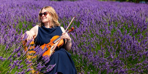 Emily at Yorkshire Violinist relaxing in the Yorkshire sunshine in July 2026 at Yorkshire Lavender