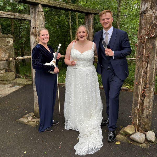 Emily with couple after their ceremony at The Hidden Oaks in the Ribble Valley north west wedding