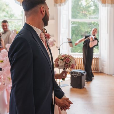 Emily Harding / Yorkshire Violinist serenades newlyweds as they exit their ceremony at Alfreton Hall