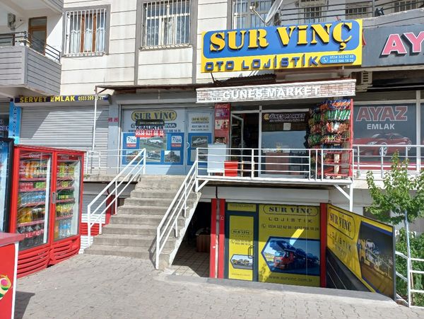 A building with stores at the first floor