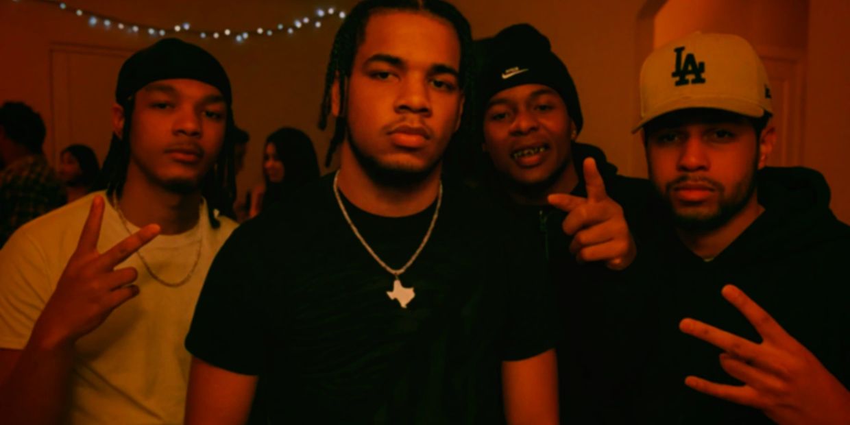 18 year old East Twizzy with fellow artists at a party