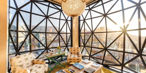 Hotel room with panoramic windows overlooking downtown cape town