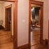 Front entryway with doorways to formal dining room and cozy living room with electric fireplace