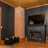 View from the couch with cozy blankets for all, Smart TV, and double sided electric fireplace