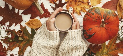 Cup Fresh Roasted Coffee hands sweater pumpkin fall leaves walnut oak maple earth tones