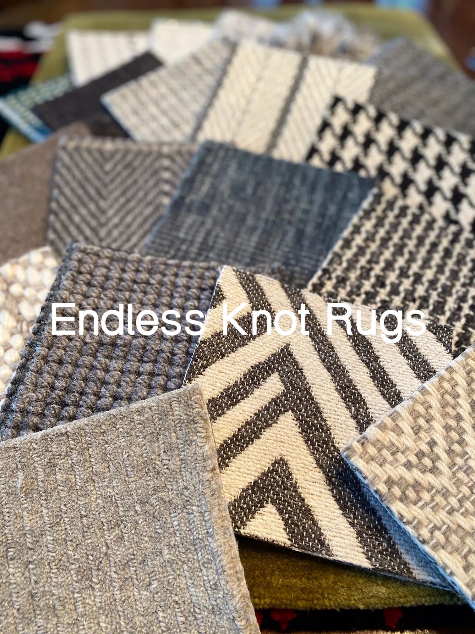 Close-up of various textured rug samples.
