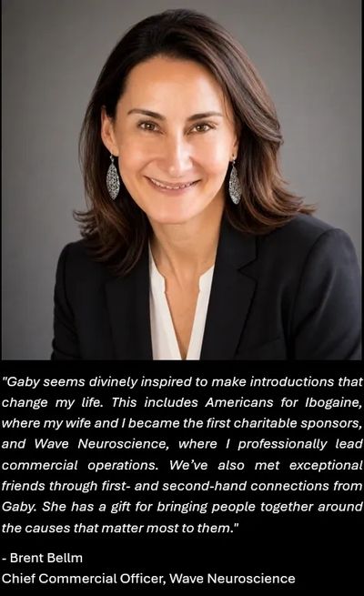 Professional portrait of a smiling woman in business attire.