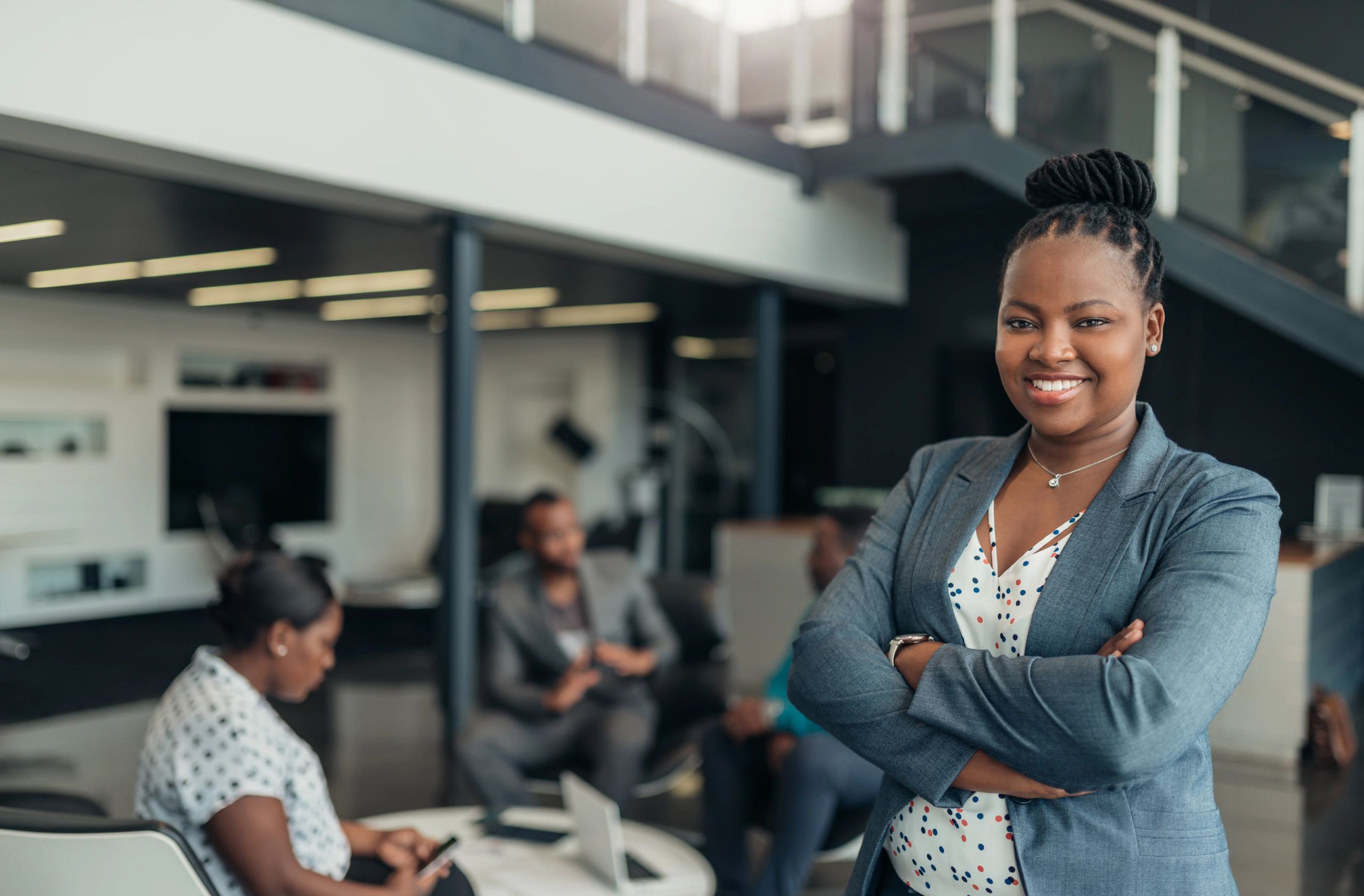 African American female standing in a business office