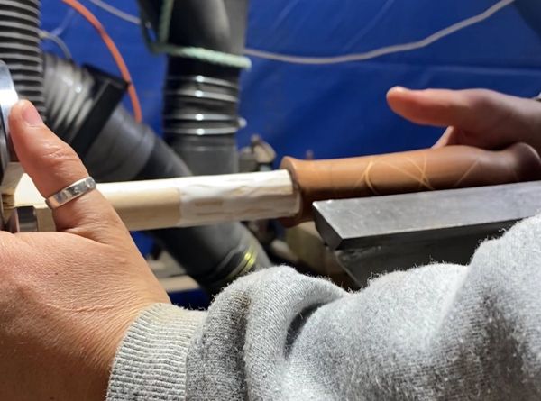 Reinforcing the handle with a turned hardwood spindle