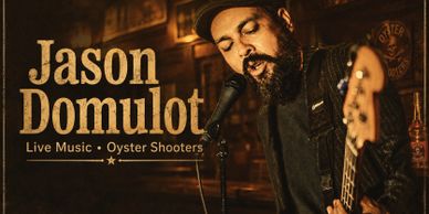 Jason Domulot performing live music at Oyster Shooters.