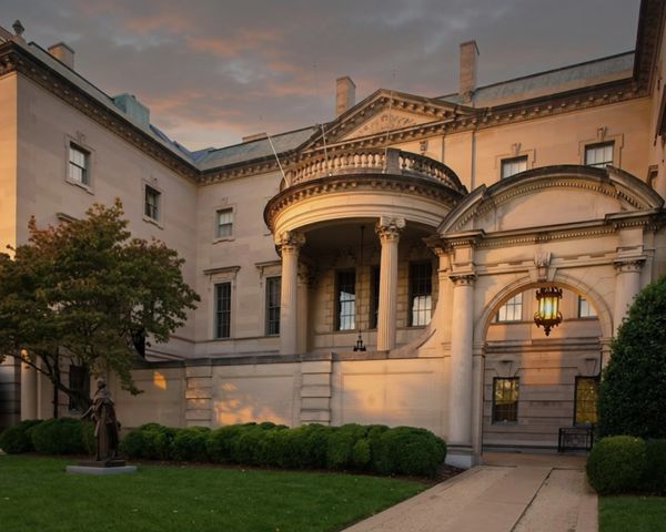 Historic building with classical architecture at sunset.