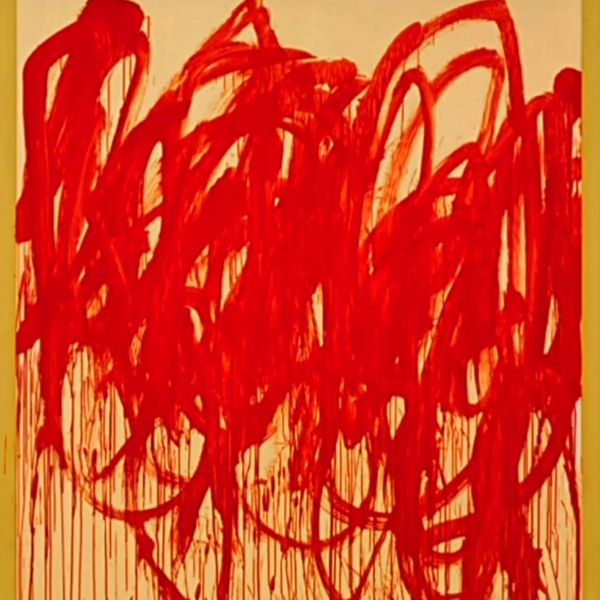 Abstract red chaotic brush strokes on beige canvas.