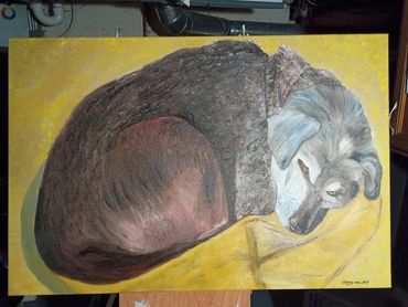 Painting of a sleeping dog curled up on a yellow surface.