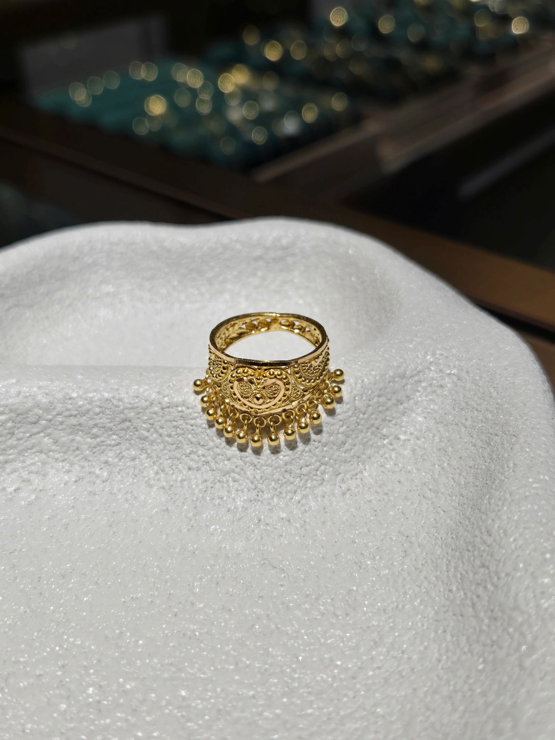 Filigree rings with drops 
