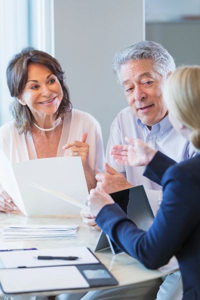 Advisor meeting with a senior couple.
