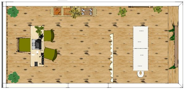 Top view of a spacious office layout with desks, chairs, and plants.