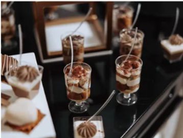 Elegant dessert cups layered with cream, cake, and chocolate—rich, refined, and perfect for events.