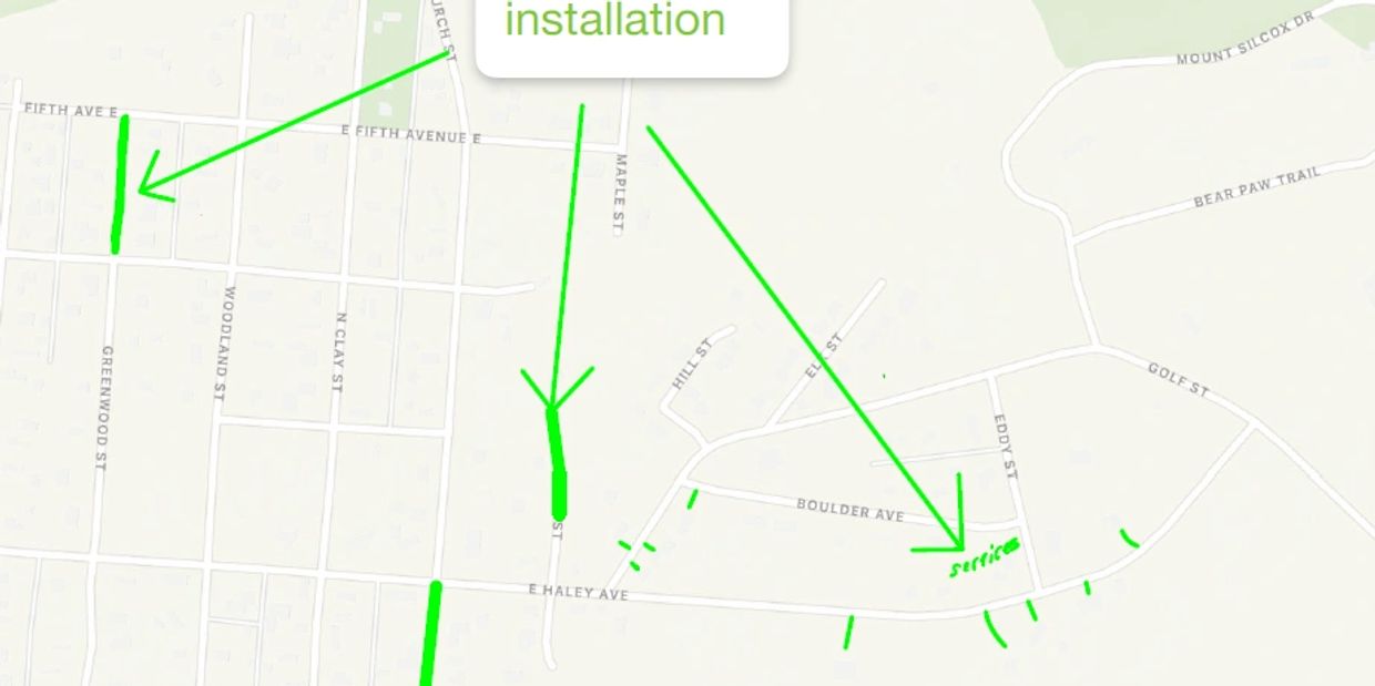 Map with green arrows and lines indicating installation and service points.