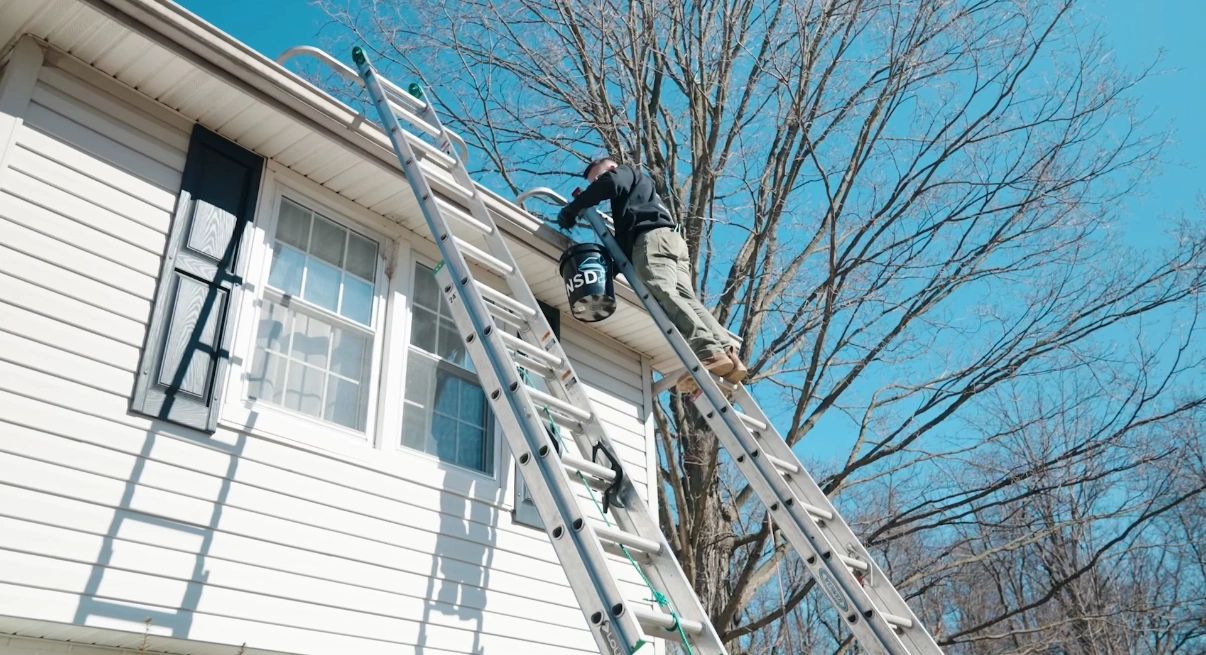Curtis Cleaning Gutters In West Chester, PA