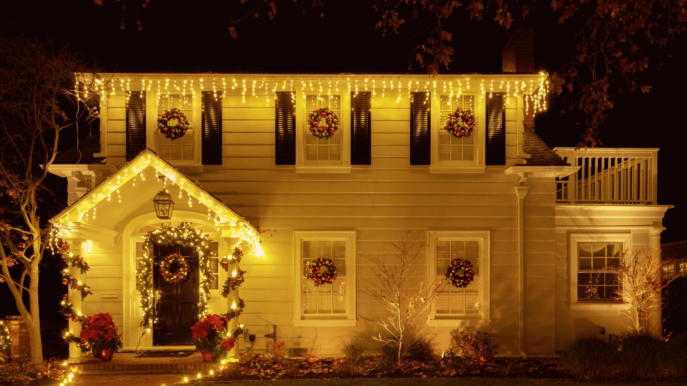 custom fit holiday and Christmas lighting installed on a home's roofline.