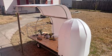 Emergency shelter partially built; a safe place to sleep, sit w/ sun & rain protection, secure your 