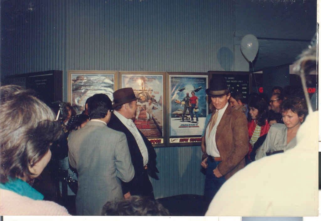 Roy_Clark___Mel_Tellis_showing_off_movie_poster.jpg