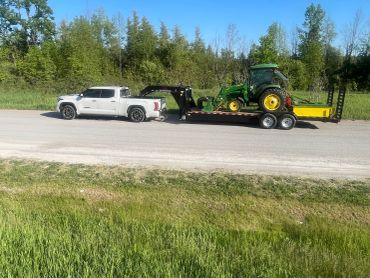 Float service available for hay, straw and, small equipment.
