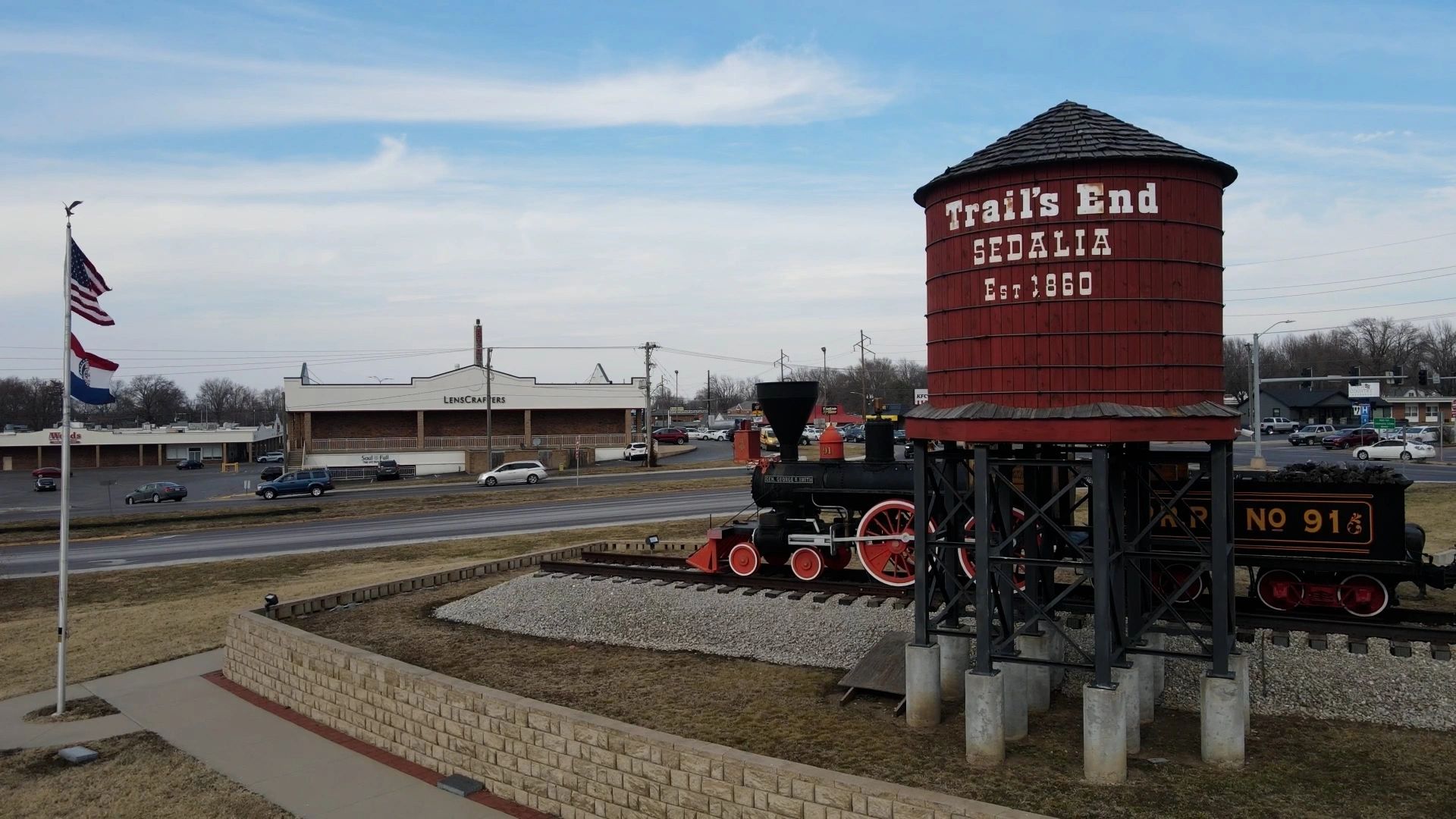 Historic Trail's End water tower and vintage train in Sedalia, Missouri.