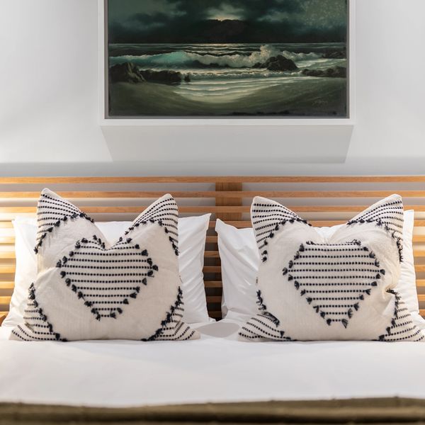 Luxury bedroom with picture of Table Mountain