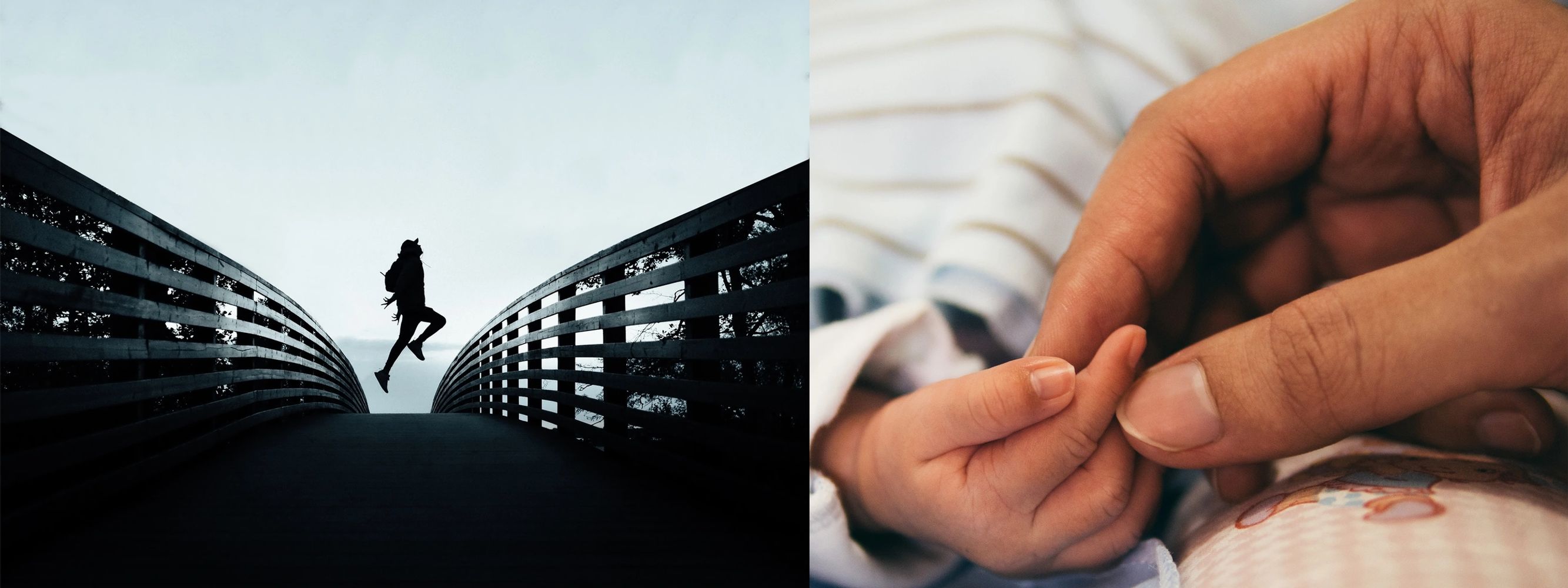 A baby holding an adult's finger gently.