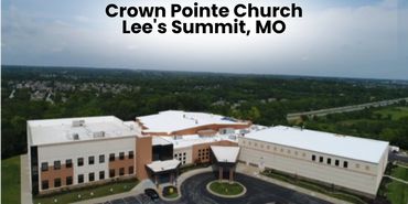 Aerial view of Crown Pointe Church in Lee's Summit, MO on a cloudy day.