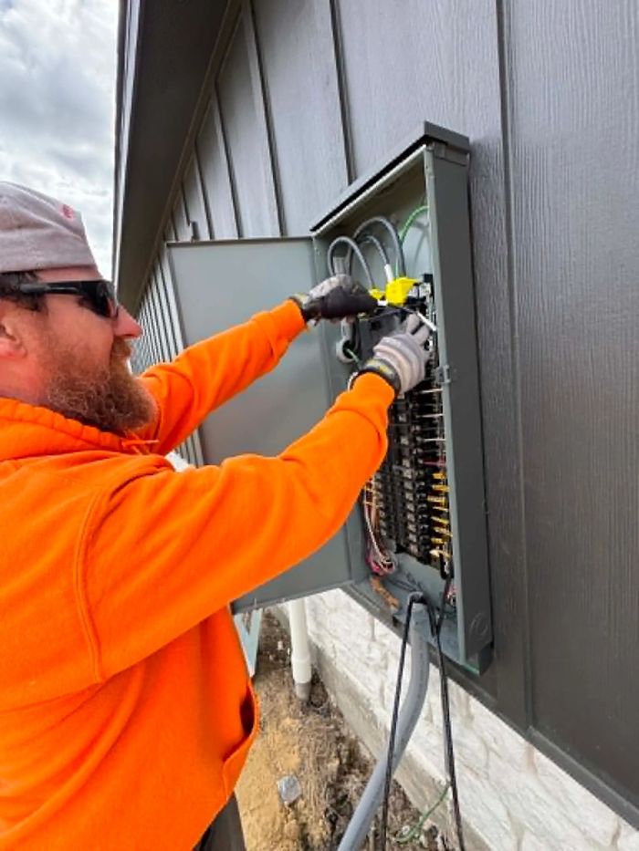Our Master Electrician working on a new service build. 