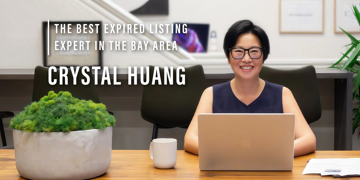 Crystal Huang, the top expired listing expert in the Bay Area, smiling at her desk.
