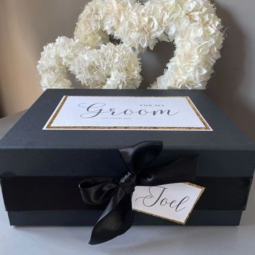 Black Keepsake Box for a groom, with white & gold label and Black Ribbon & Bows.