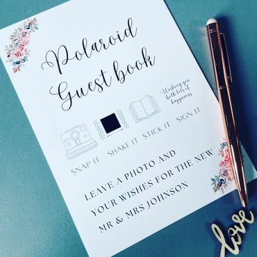 Wedding guest book sign with pen