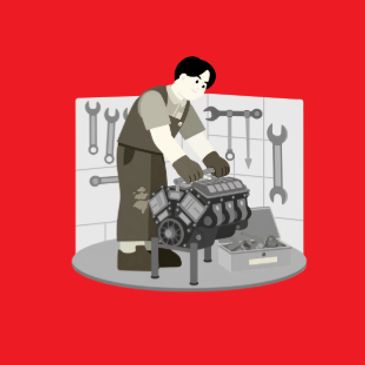 Mechanic working on an engine with tools in the background.