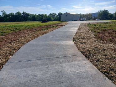 Large Concrete Driveway and Parking Lot