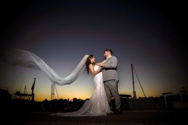 Bride and Groom sunset veil at Sunset Harbour in Patchogue