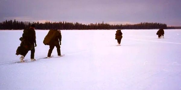 A team working together to survive on a mission in the frozen wilderness.  Photo credit: Chris Flynn