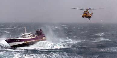 Ship in distress with rescue helicopter arriving. Credit: Royal Air Force, flicker.com