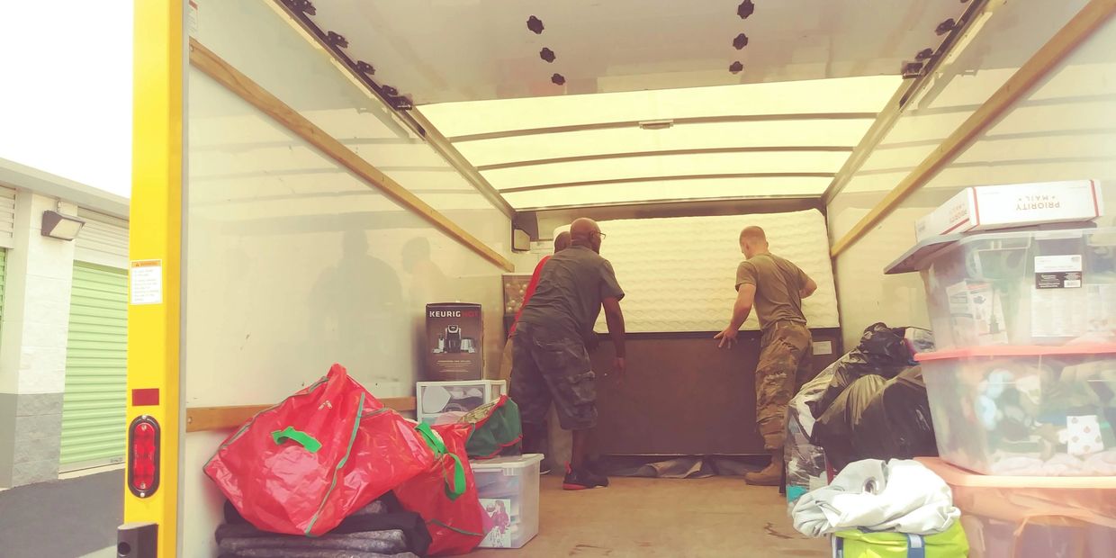 Movers loading a rental truck in Suffolk VA.