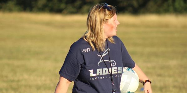 Helen Carrying A Ball While Watching Ladies Football 4 Fun Training