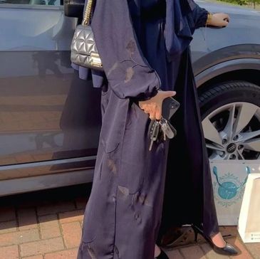 classy abaya showcased outdoors