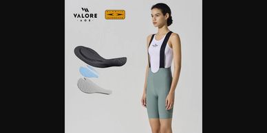 Female cyclist wearing Valore bib shorts with detailed padding layers shown.
