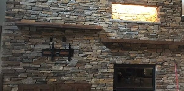 Accent lighting in rock wall, with tv mount done by Mick's Electric in the Black Hills of SD.