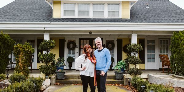 Billy and Jacqui Mann standing outside in front of the Inn